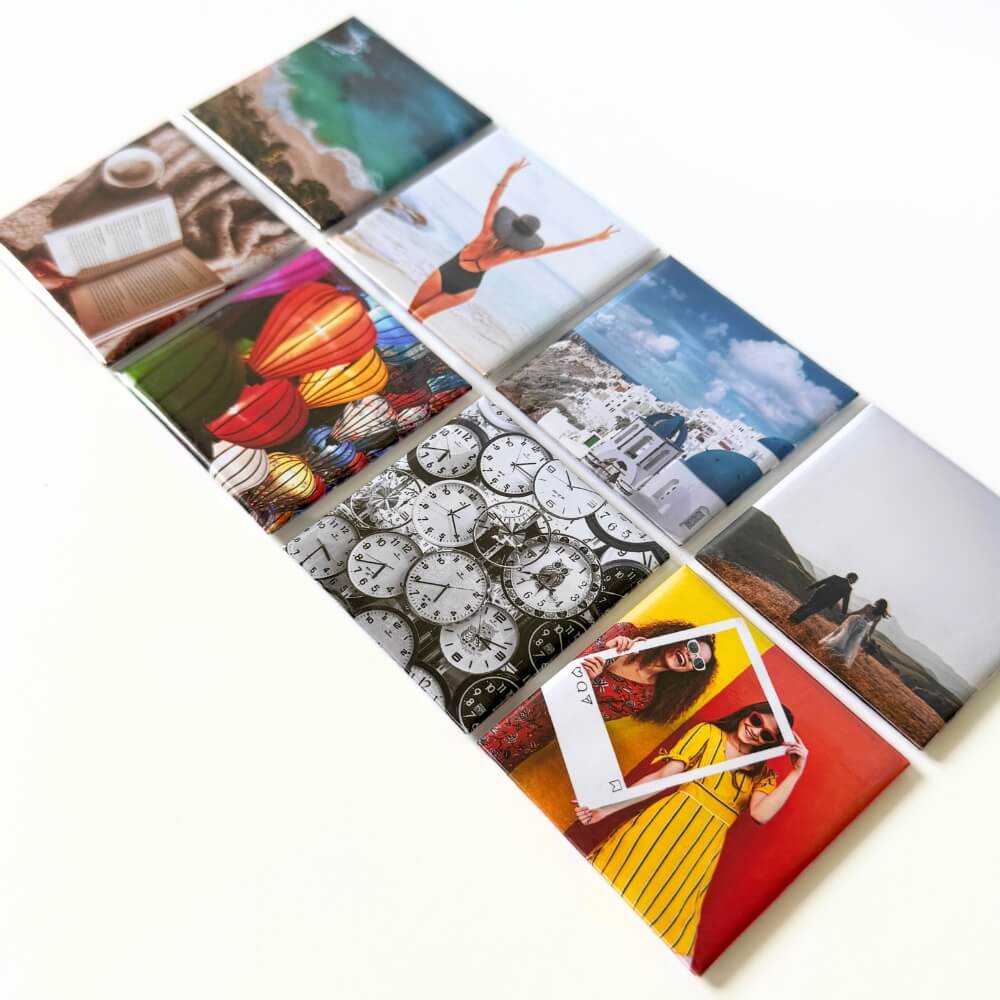 Image shows a flat lay of a set of 8 square photo magnets, displaying their vibrancy, quality and options for images which could be turned into magnets.